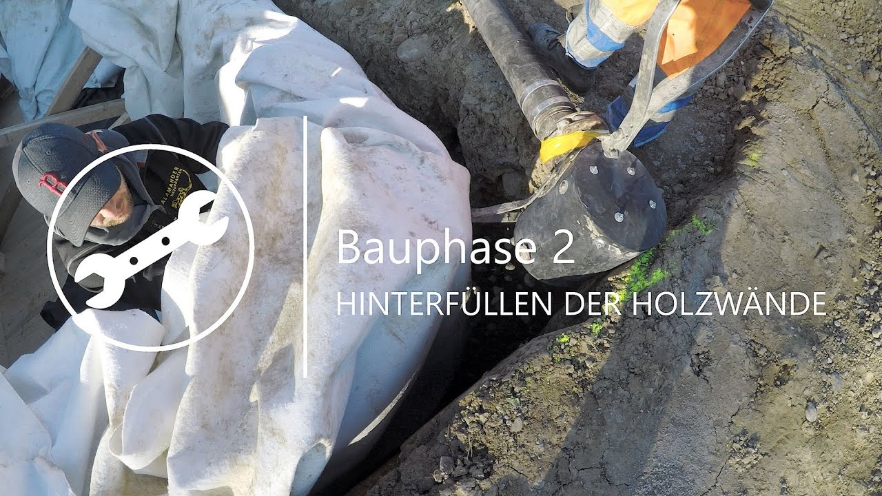 Bauphase 2 · Hinterfüllen der Holzwände