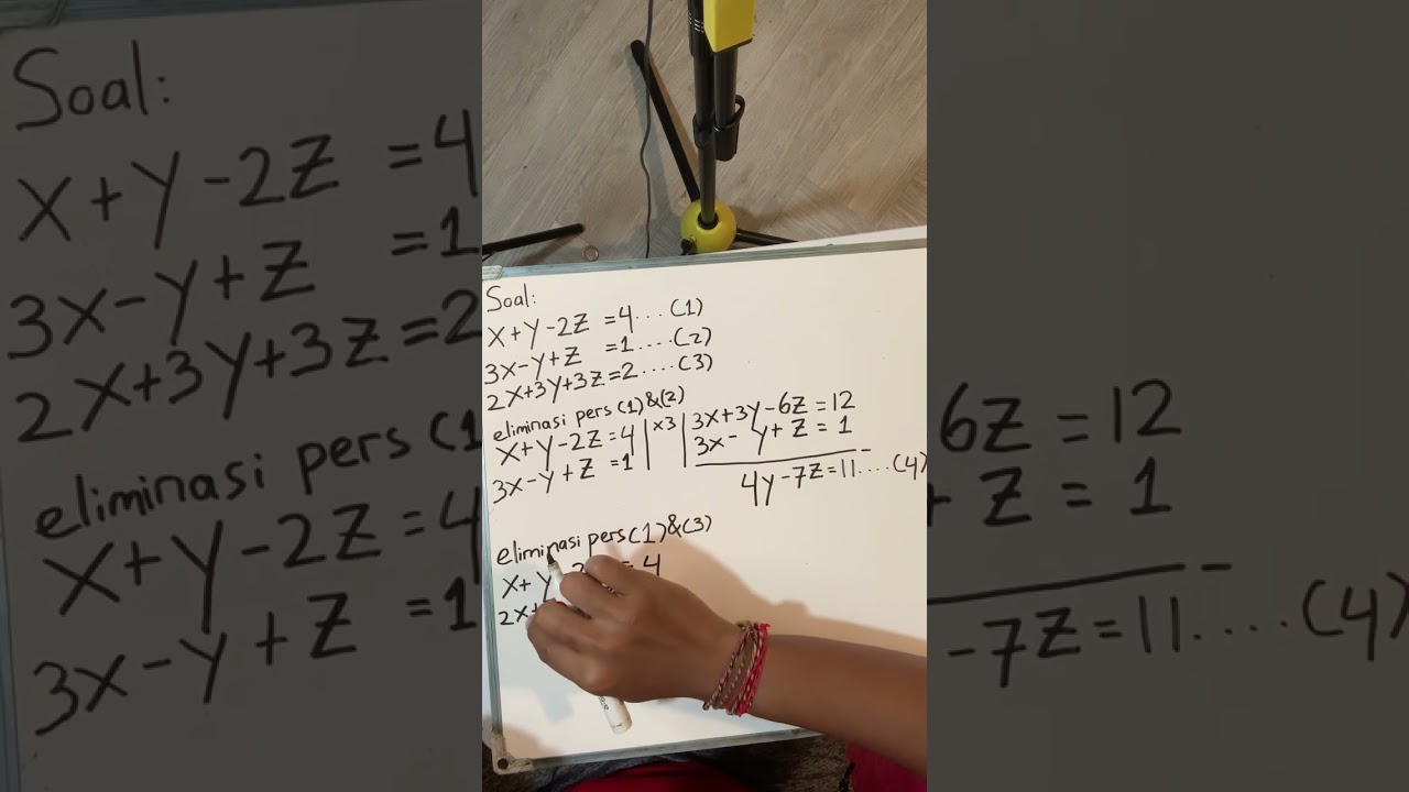 menyelesaikan sistem persamaan 3 variabel persamaan linear dengan metode eliminasi