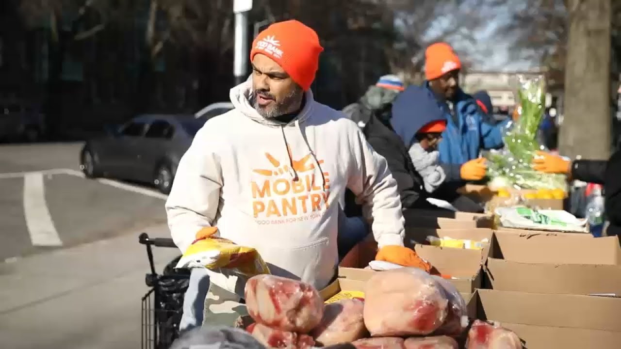 Flight attendant embodying MLK's legacy through volunteerism with Food Bank NYC