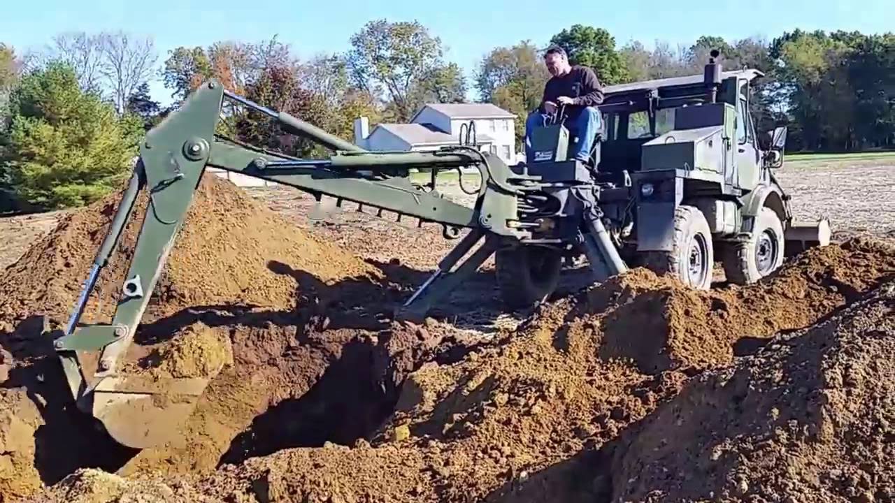Unimog FLU419 septic tank dig