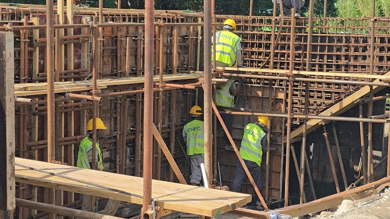 CHEC WORKERS Are Working Hard To Get The Bridge in Leith Hall  Ready 