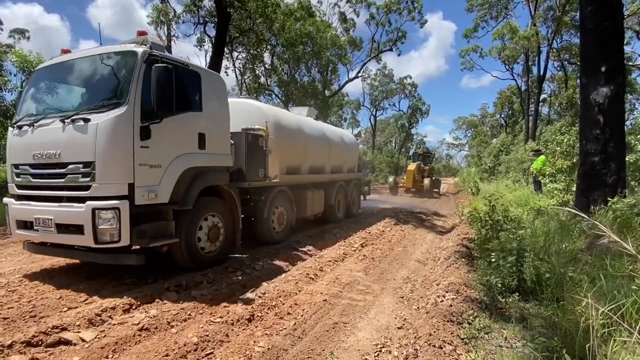 Heavy Grade.  Gravel material wasted to batters, not ideal.