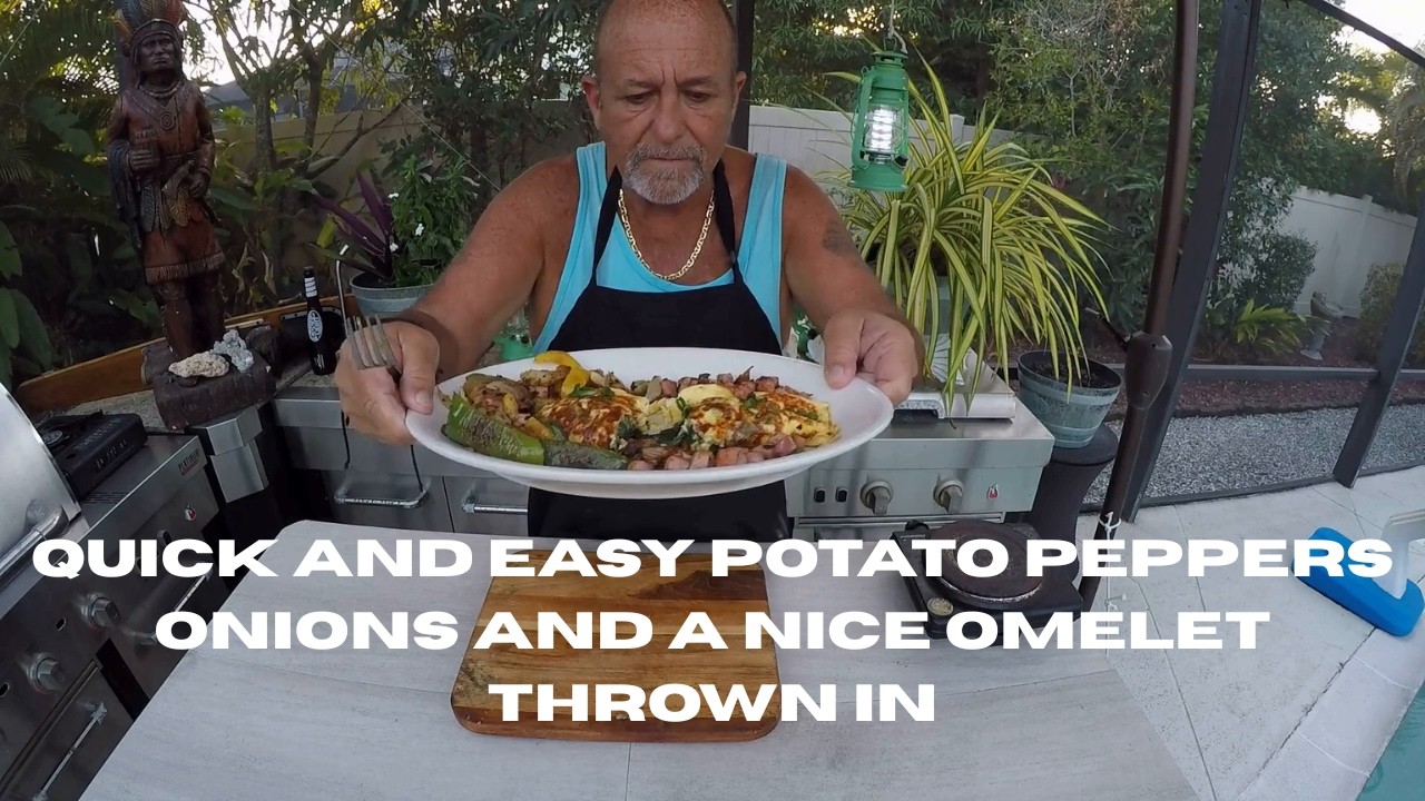 VERY QUICK POTATOS PEPPERS ONIONS WITH HAM  AN OMLET TO BOOT ALL OUTSIDE