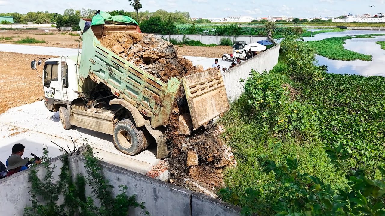 First Start Stone Filling Task! Good Operators Of Bulldozer And Dump Trucks Working