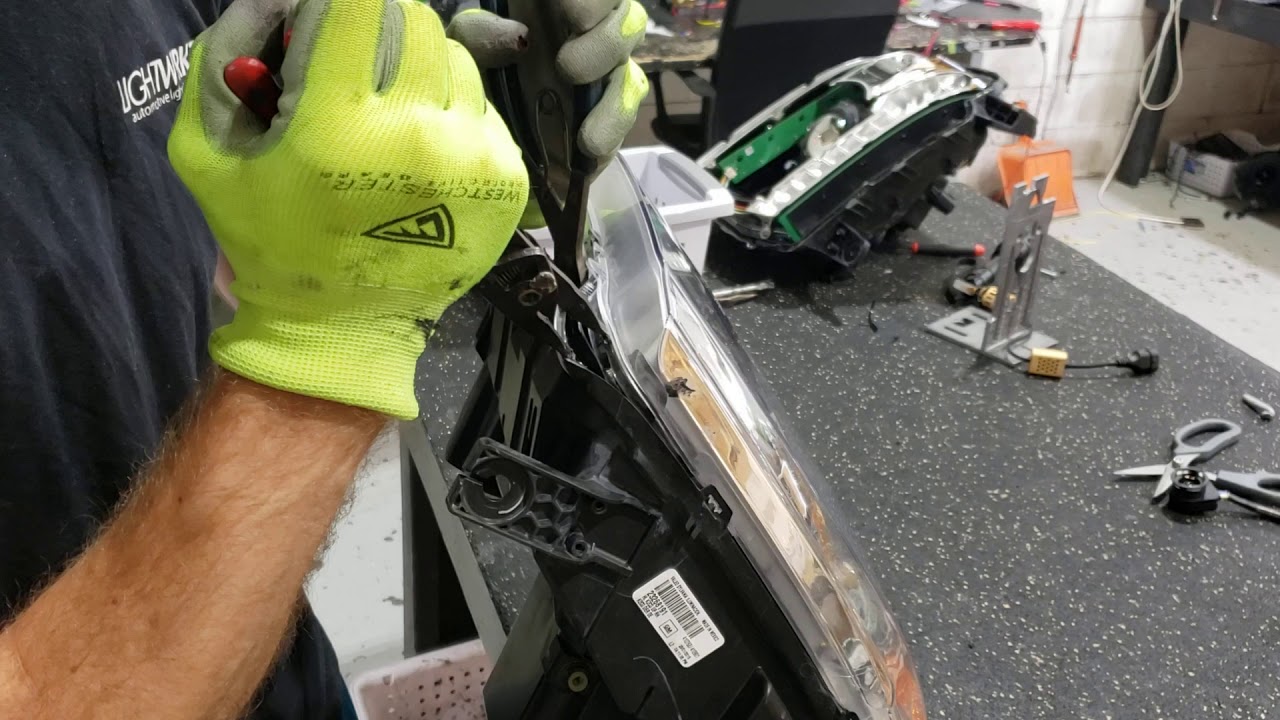 Opening up a Perma-sealed GMC Sierra Headlight