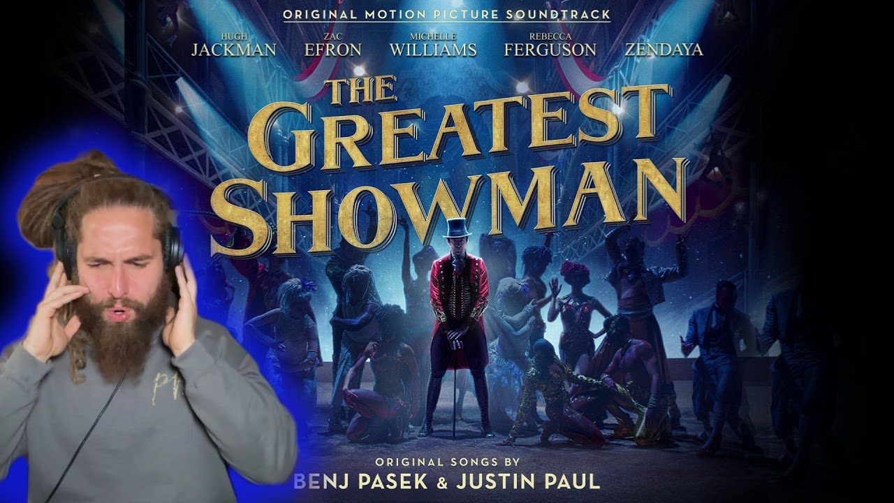 Rapper listens to the The Greatest Showman for the first time!