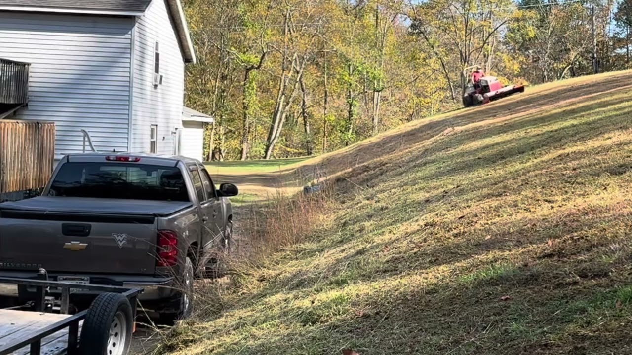 Mowing a large field on a beautiful fall day, till dark!