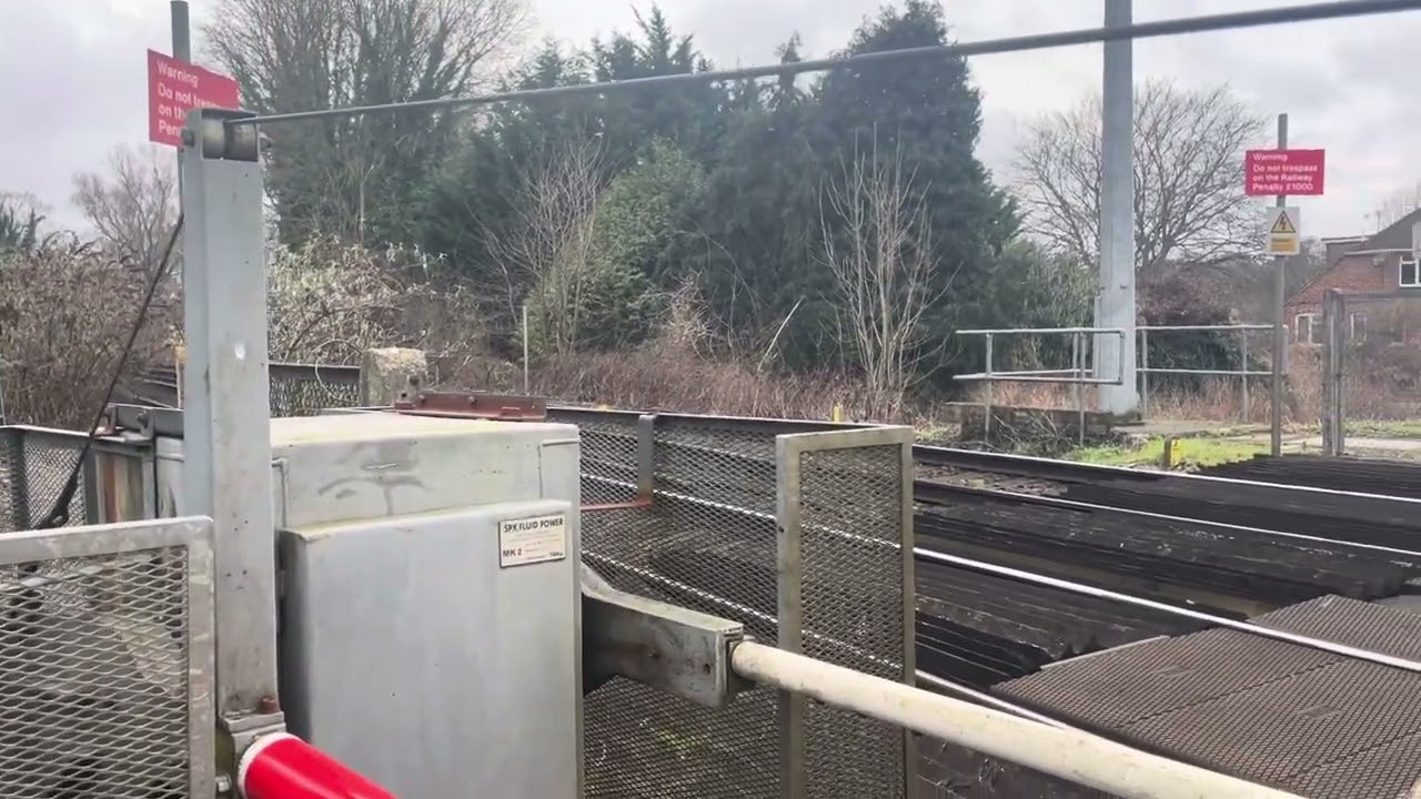 Chilham Mill train gates, and two high speed trains.Canterbury.