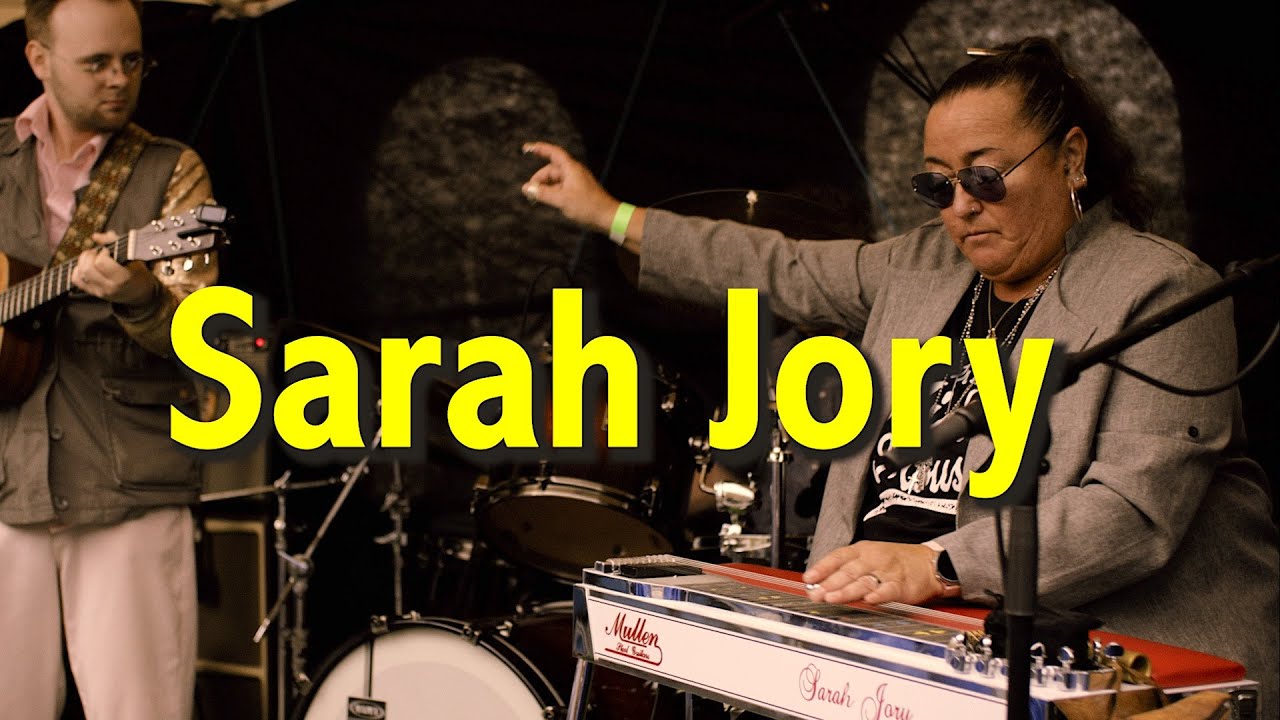 Sarah Jory plays Glen Campbell