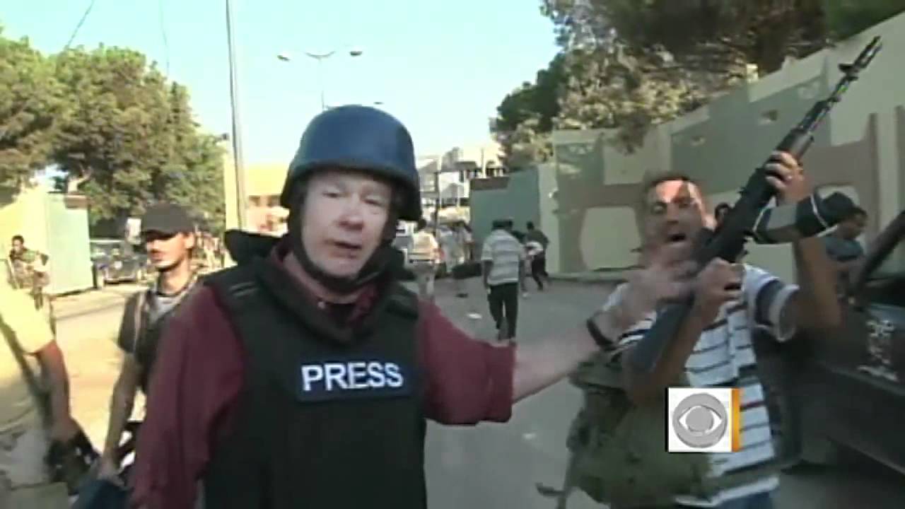 Qaddafi calls on supporters to take back Libya