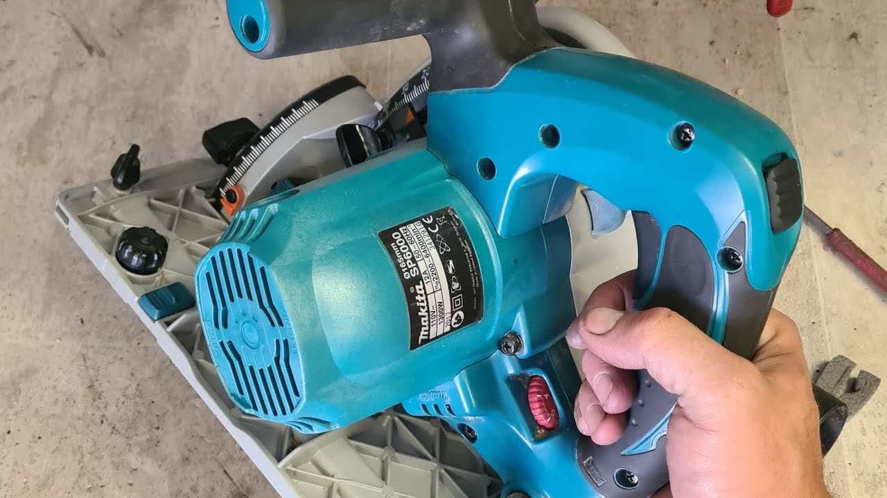 Replacing the motor on a makita SP6000 Plunge saw. power tool repairs.