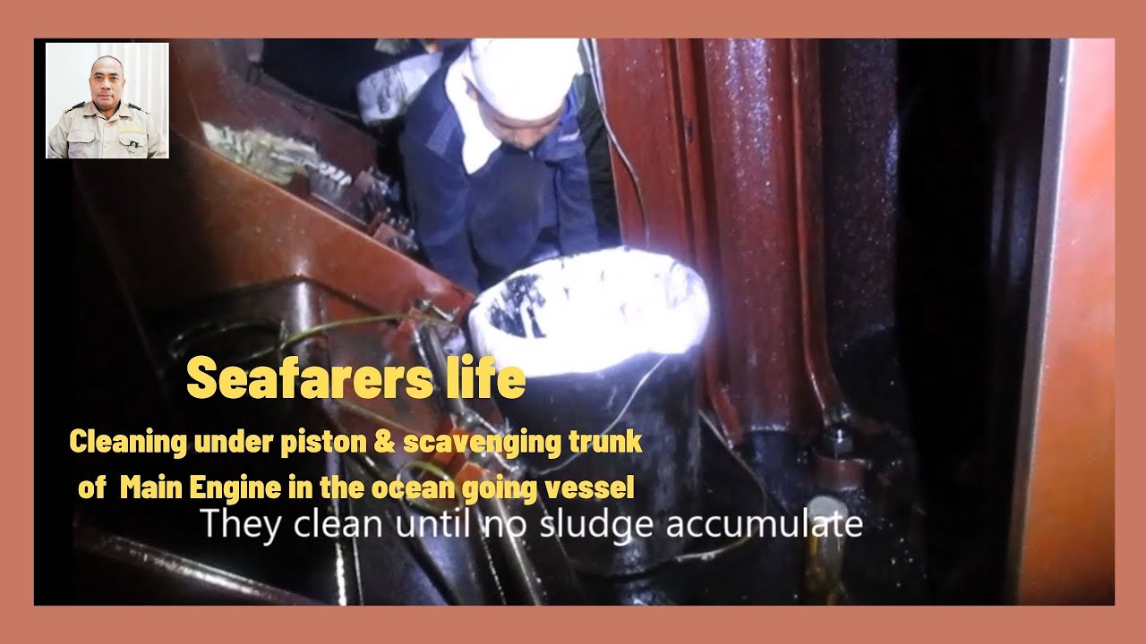 Cleaning the under piston & scavenging trunk of Main Engine in the ocean going vessel.