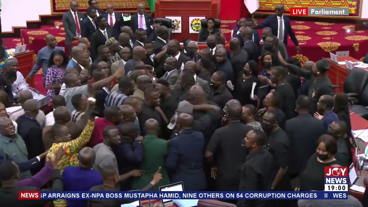 Chaos erupts in the House as Minority members cross over to the Majority side. #JoyNews