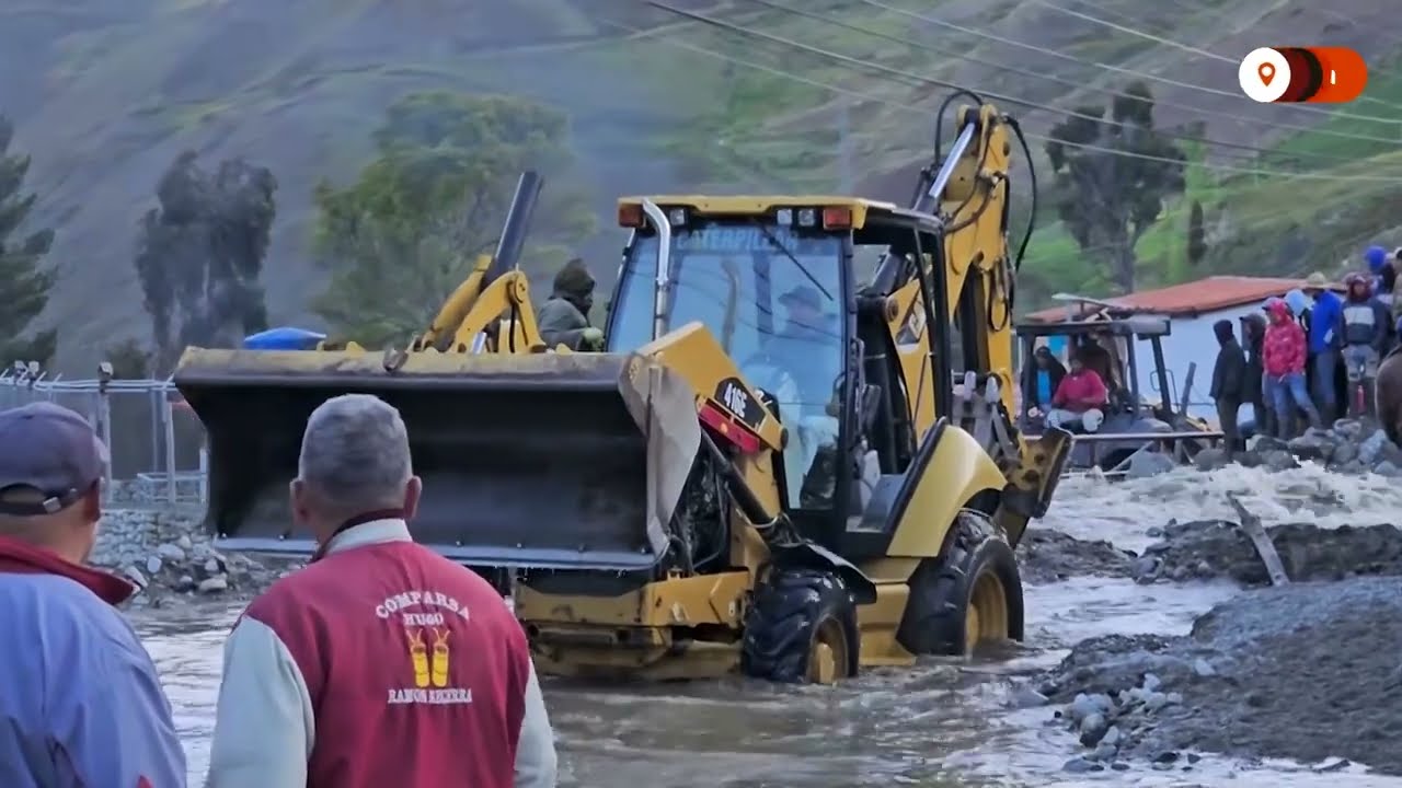 Swollen river washes away homes in Venezuela | REUTERS