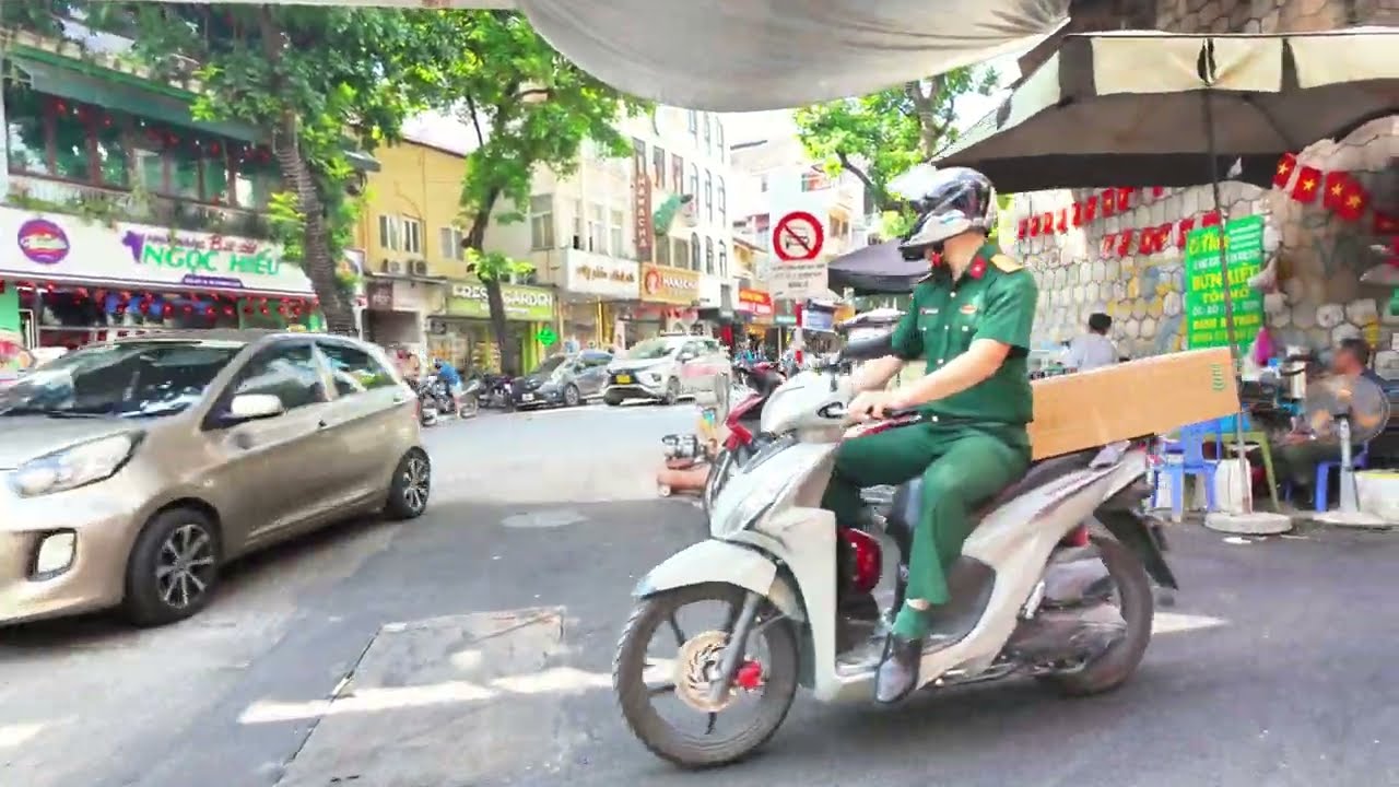 Explore Hanoi’s Contrast: Bustling Old Quarter to Peaceful West Lake