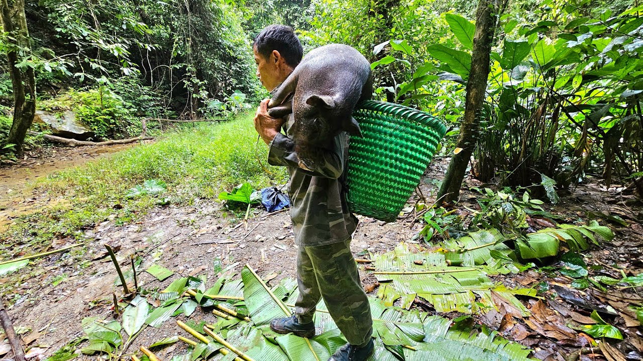 CEO Trieu Lam processes smoked wild boar that can be preserved for a whole year