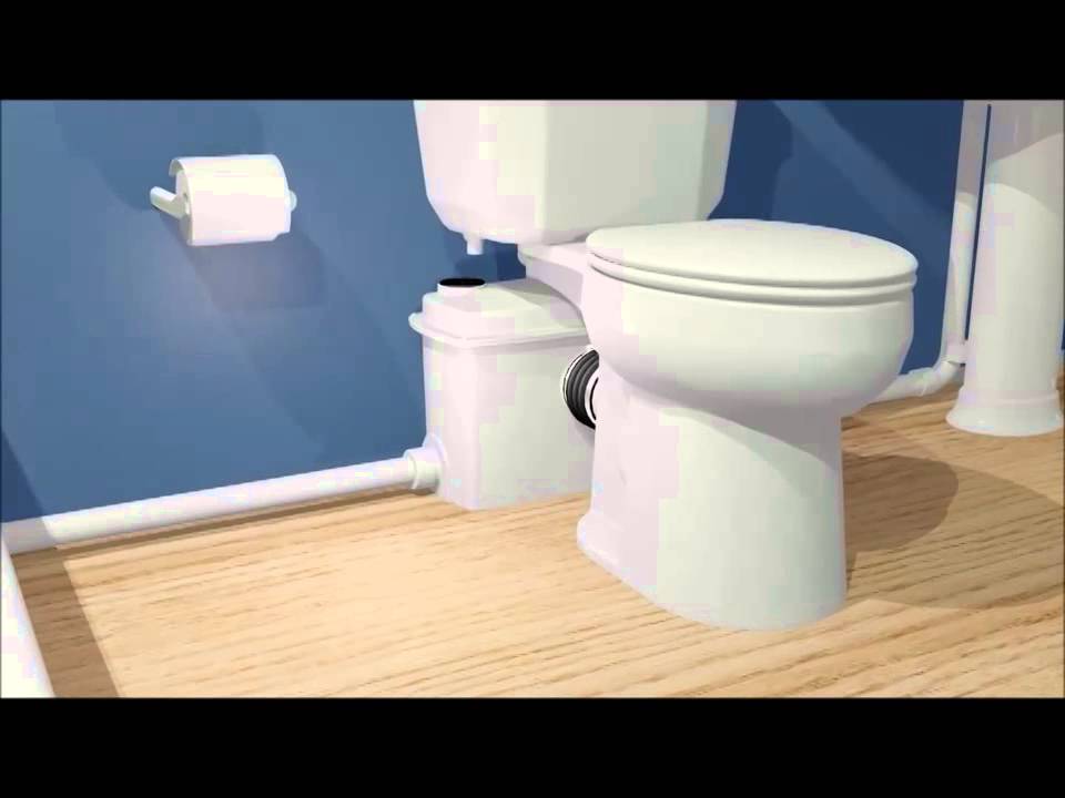 Baño WC Qwik Jon con bomba trituradora
