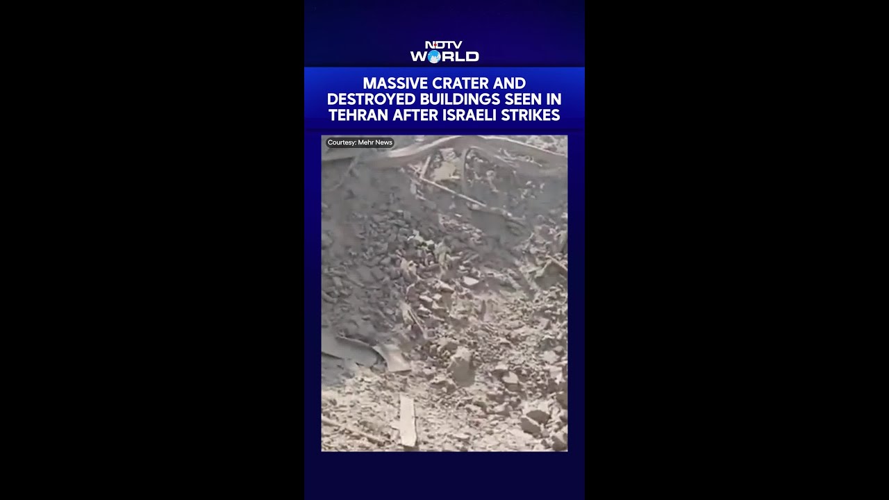 Massive Crater And Destroyed Buildings Seen In Tehran After Israeli Strikes