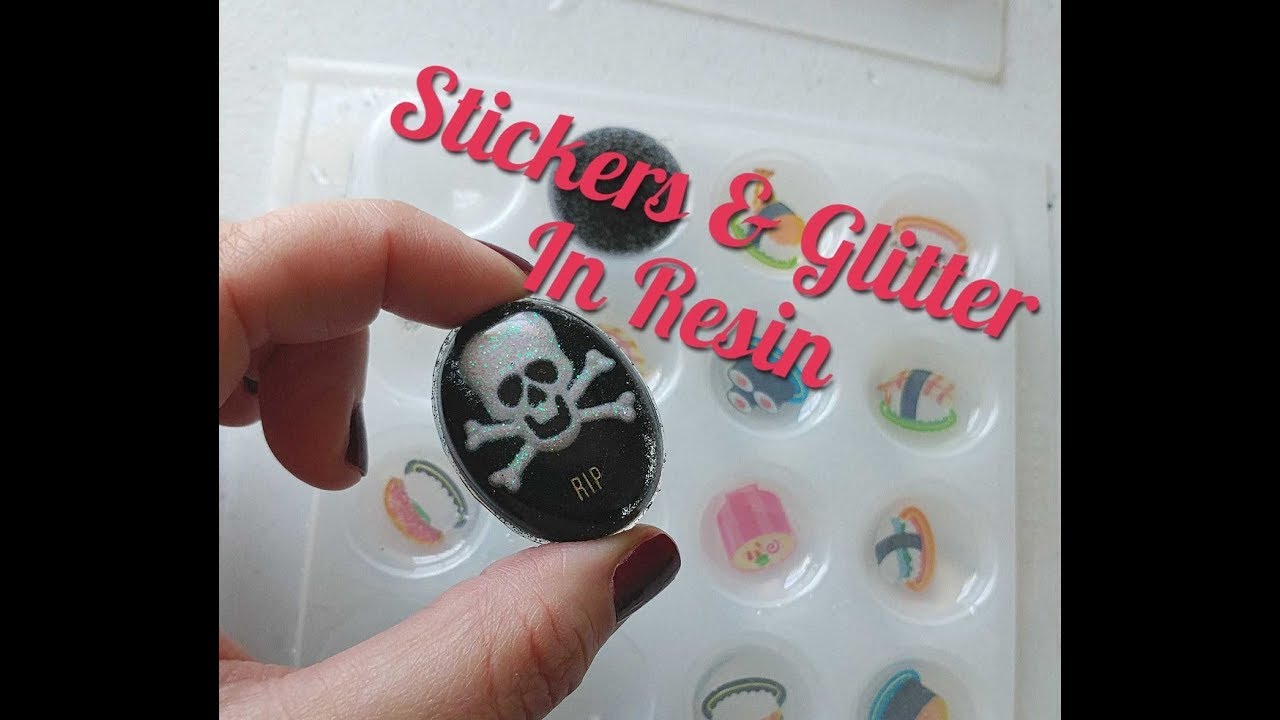 Using stickers and glitter with resin to make magnets and jewelry