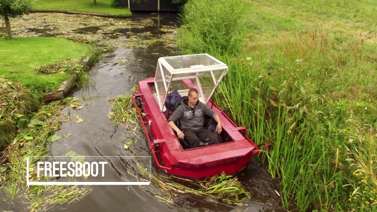 Pruim Baggerwerken B.V. Waterplanten verwijderen en opruimen met de freesboot