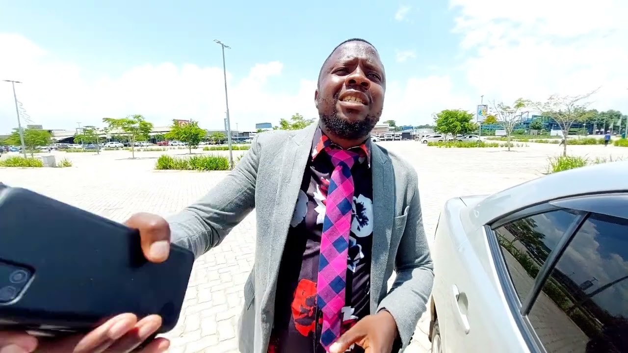Honourable Minister without Portifolio explaining the high cost of living in Zambia