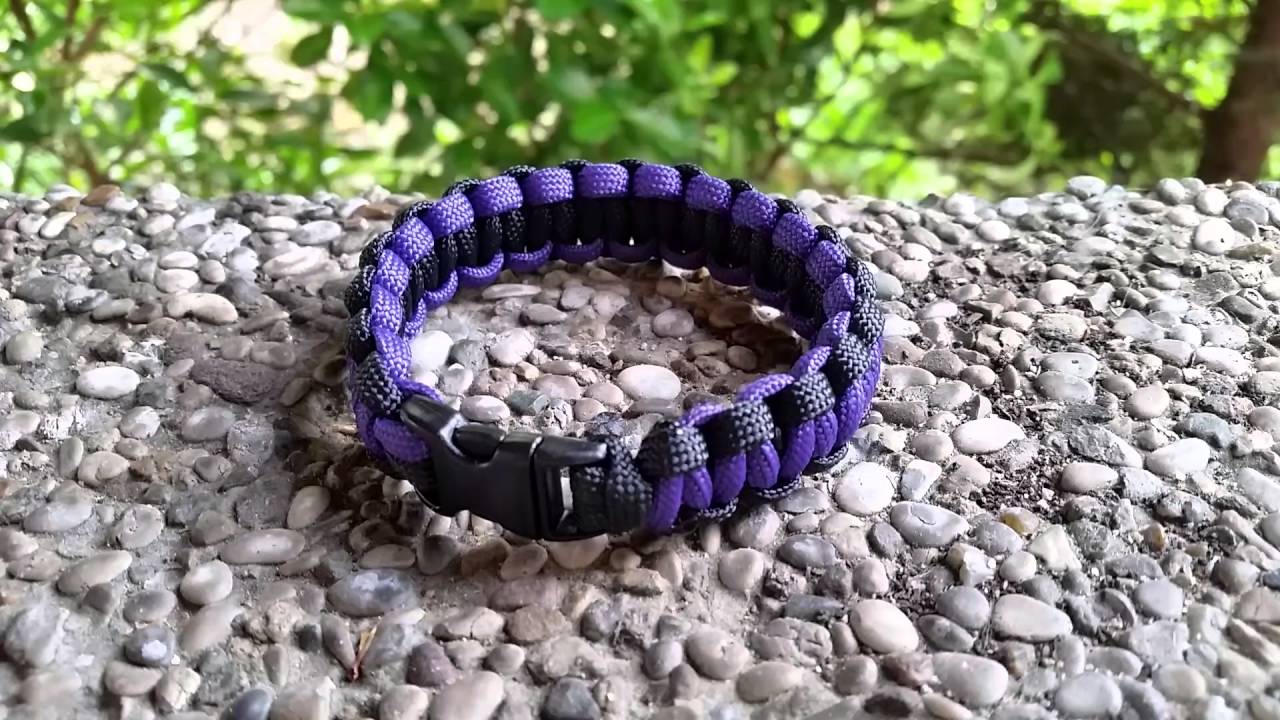 Paracord survival bracelet Cobra stitch black/violet with plastic buckle