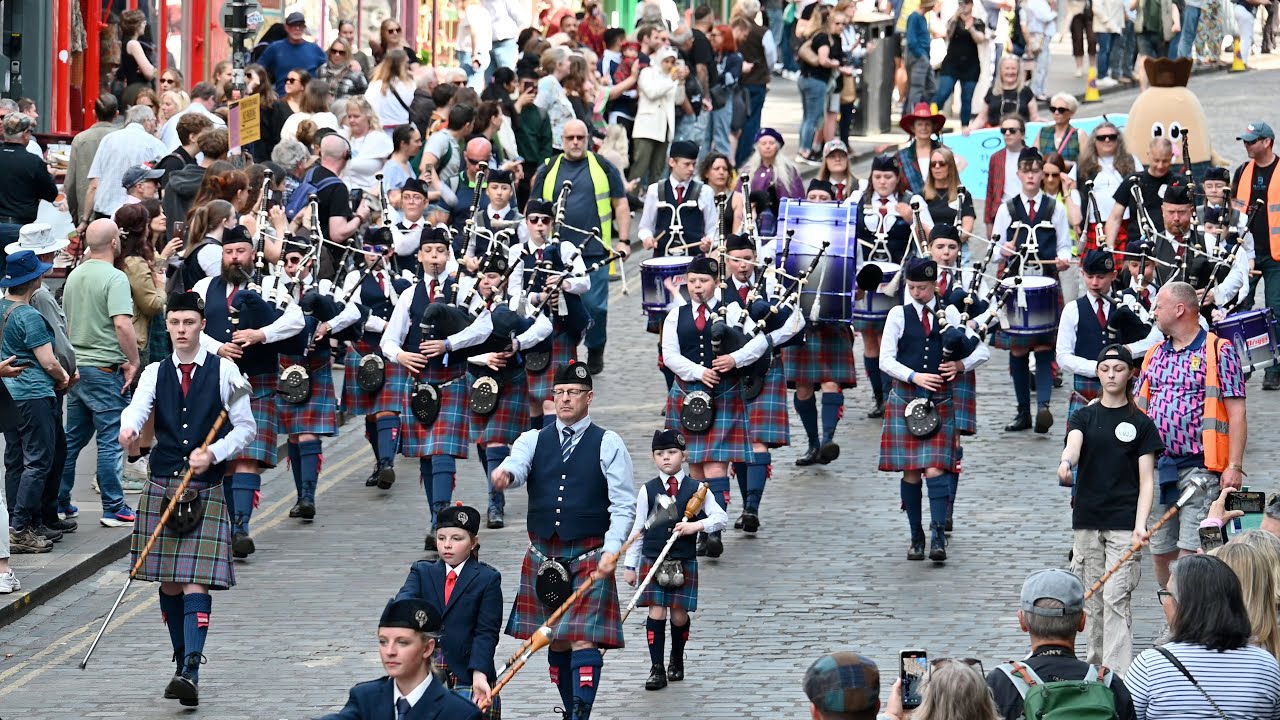 Edinburgh Tartan Parade 2025 march through Cockburn Street, Edinburgh, Scotland