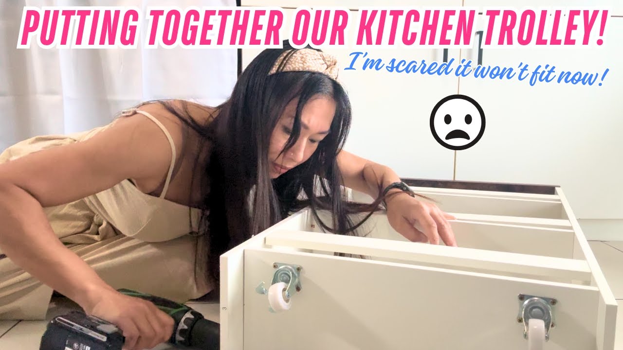 Putting together our gifted kitchen trolley! But will it fit in that gap beside the fridge?