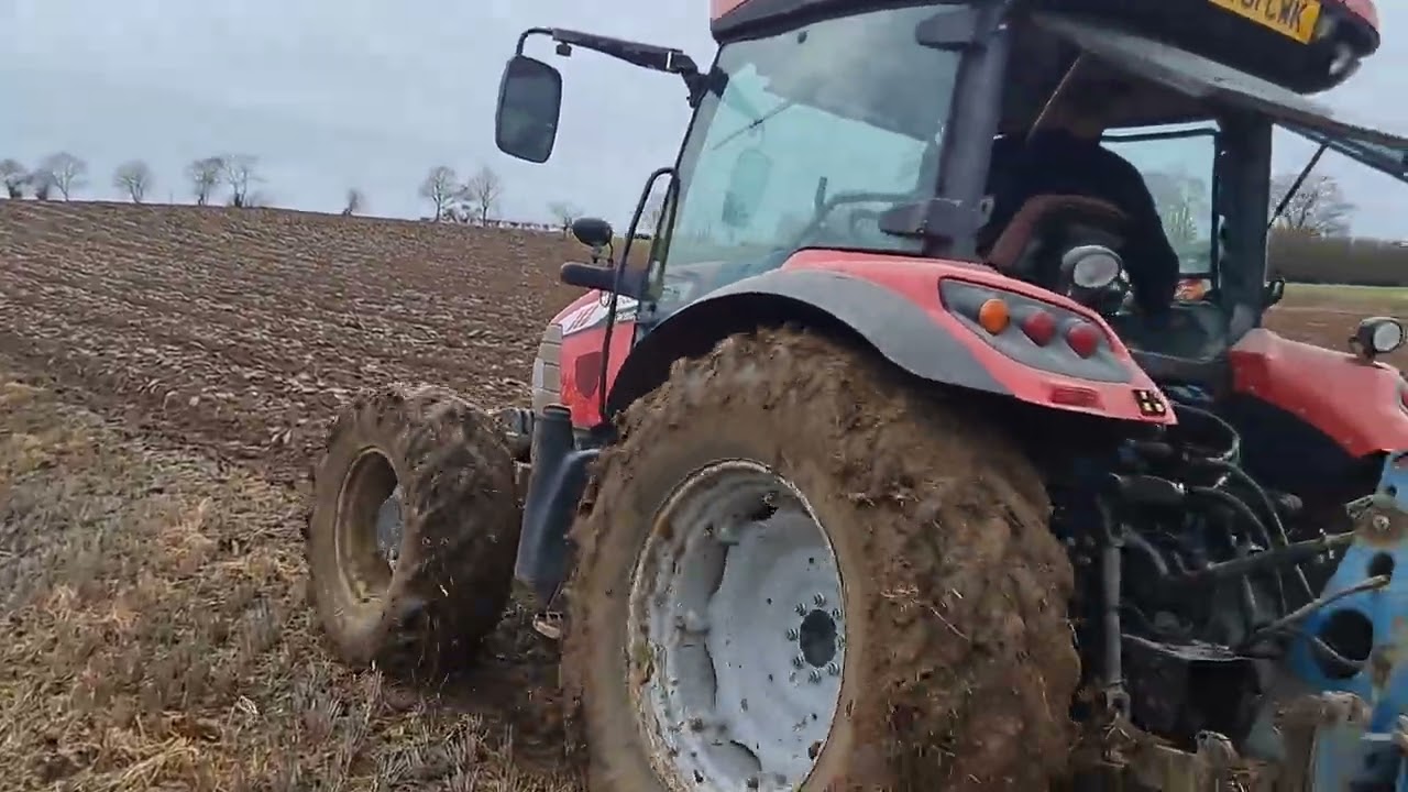 Mc cormick  x60. 40. . Ploughing with ranson four  farrow in essex