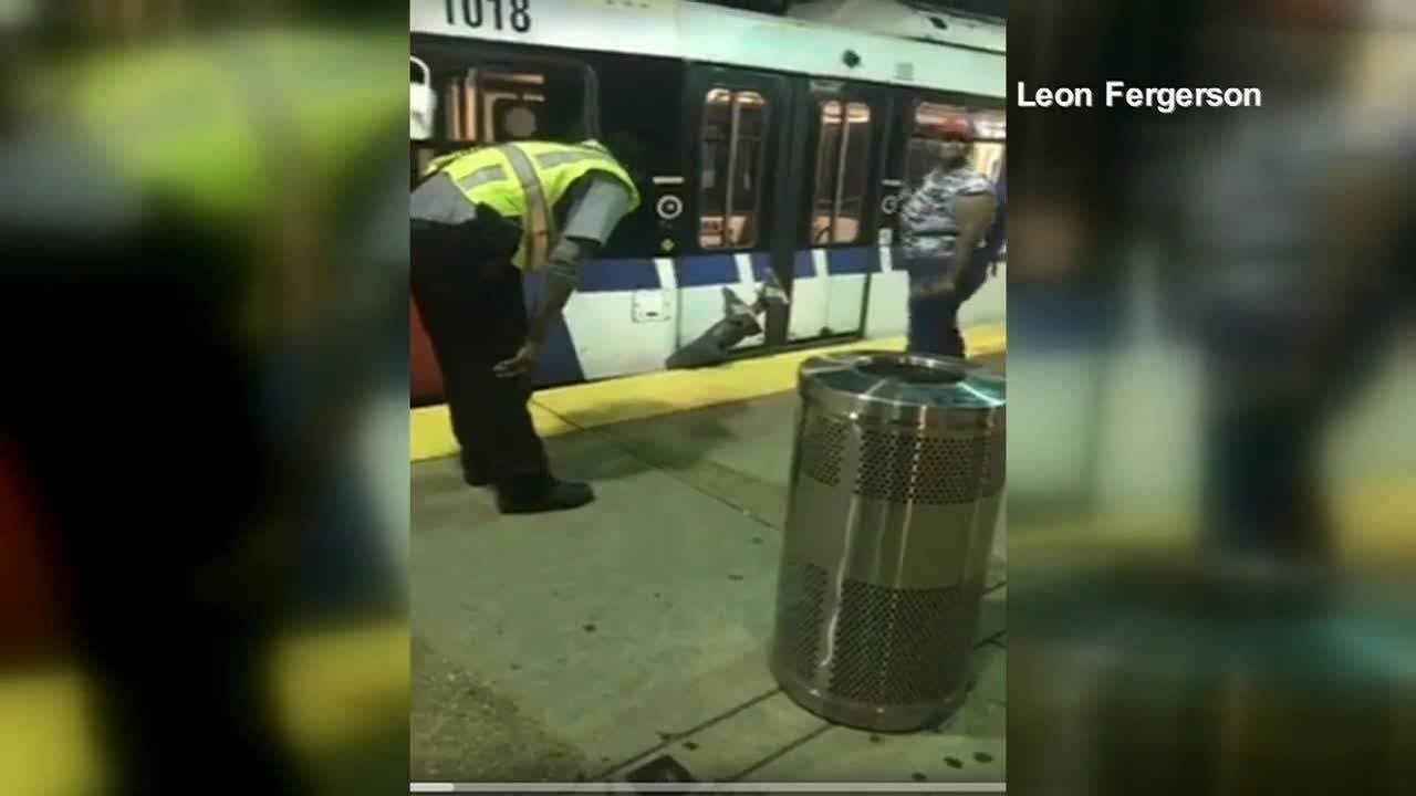 Man falls head first between train and platform