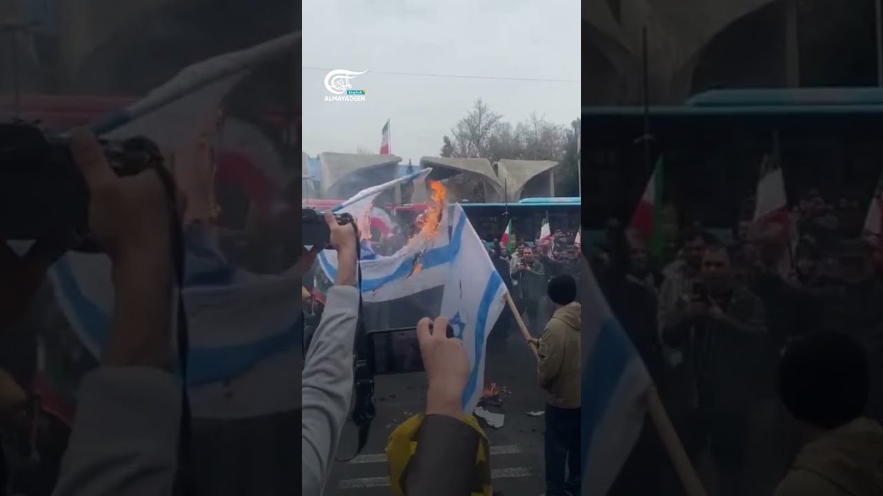 Iranians burn the Israeli flag in Quds Day rally