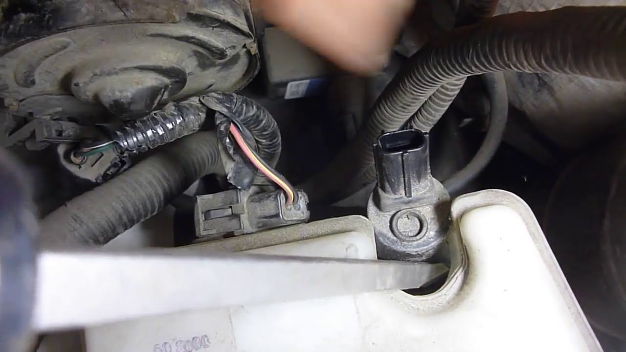 FORD EXPLORER WINDOW WASHER RESERVOIR PUMP REPLACEMENT