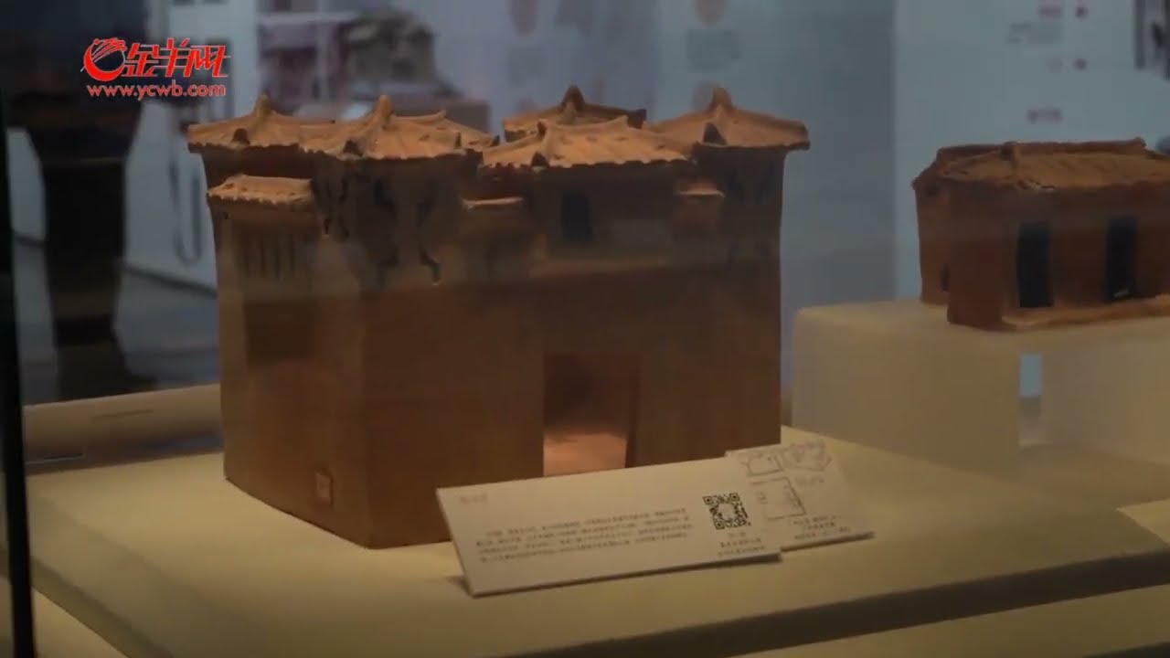 Grave goods of Han Dynasty architectural models and artifacts on display in Guangzhou