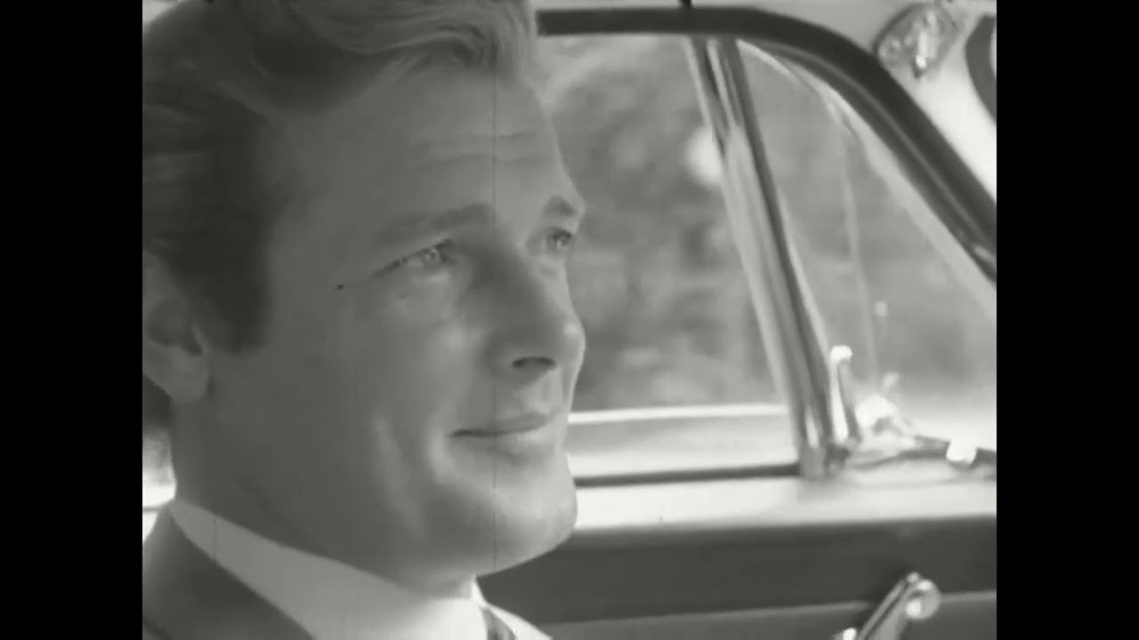 Archive 'MY NAME IS MOORE' Interview with Roger Moore driving his 