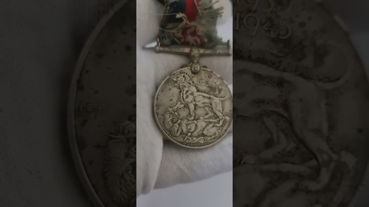 Original WW2 British 1939 - 1945 war medal with medal ribbon