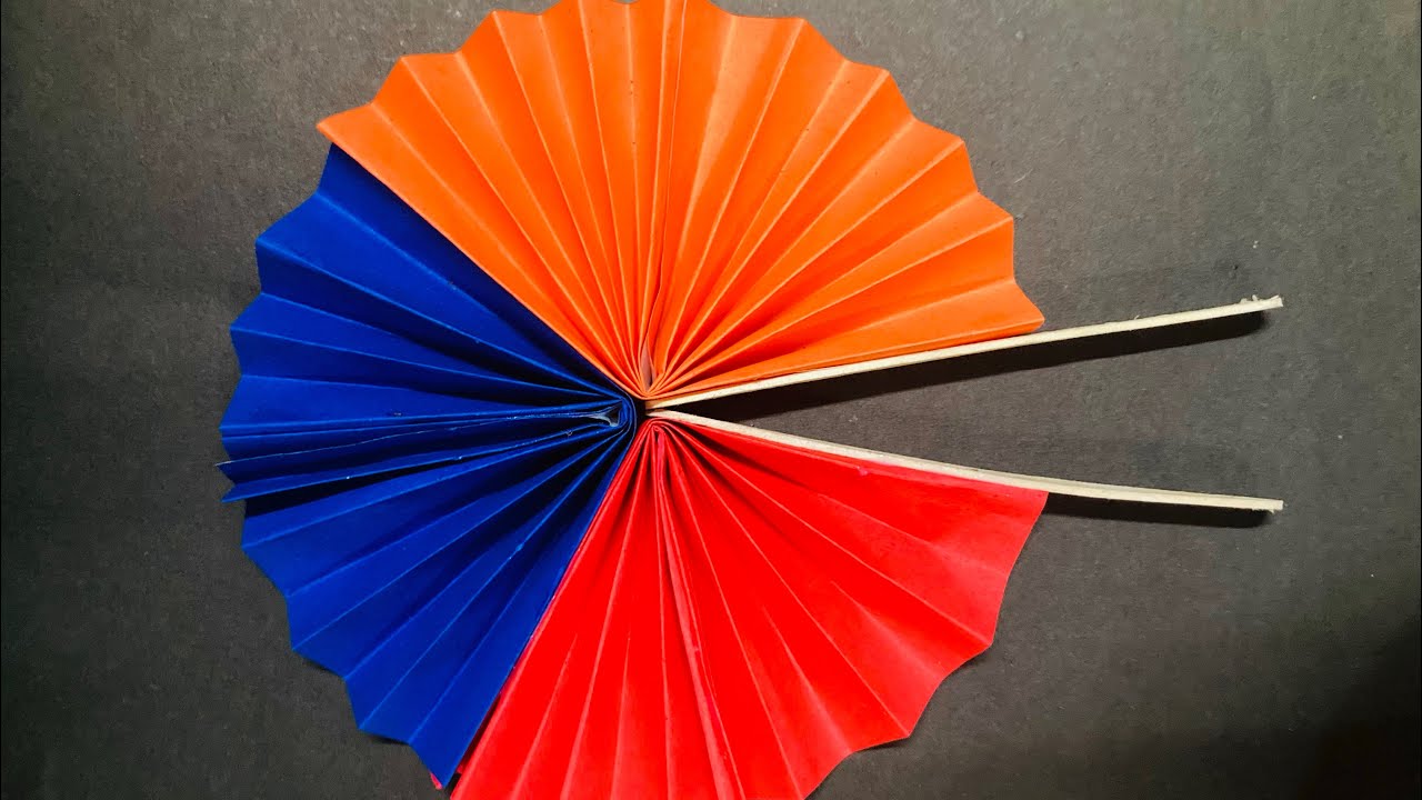 🌬️✨ Paper Fan Craft ✨🌬️ 🌈🪭&rdquo;#PaperFanCraft #DIYFan #PaperCraftIdeas #CraftyHands#handmadefan 