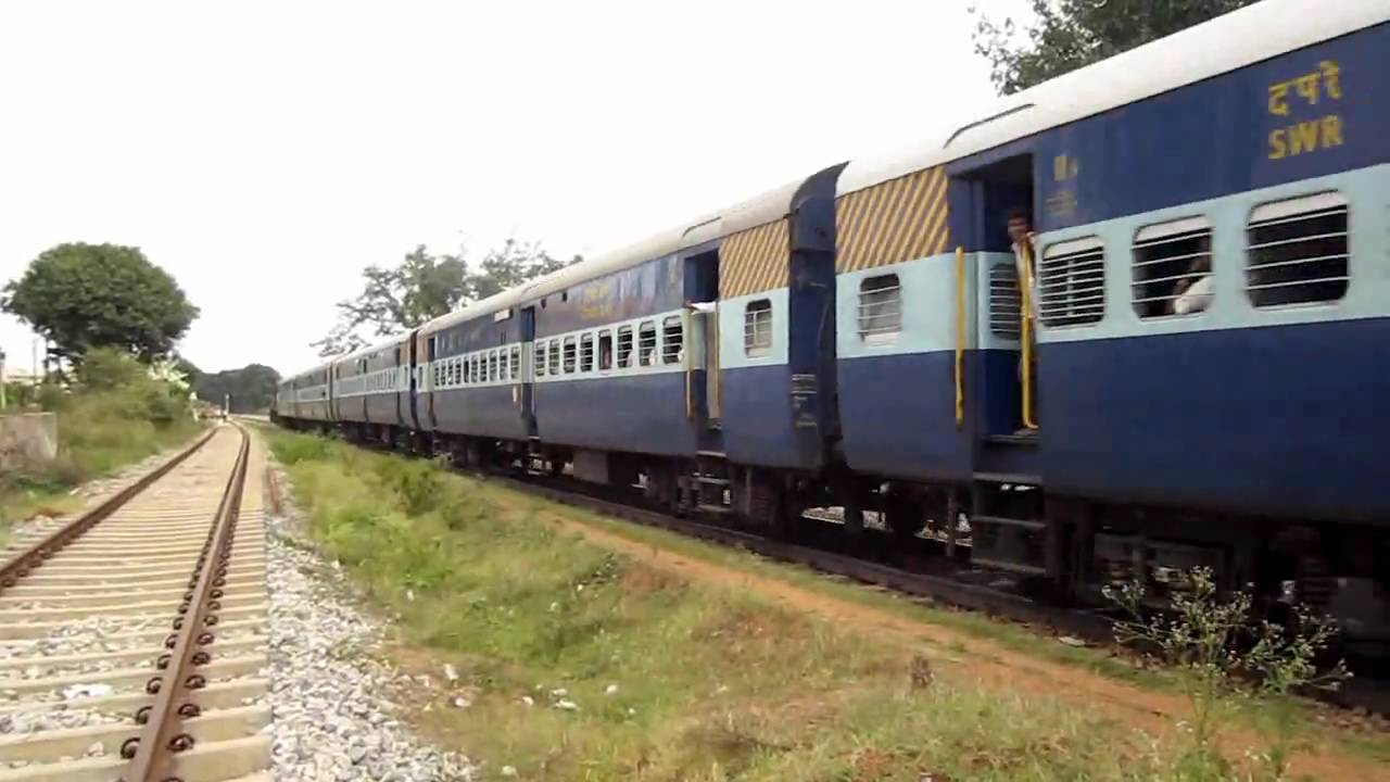 KJM WDM-3A CHUGS, SMOKES, HONKS AND ACCELERATES OUT OF SOLDEVANHALLI