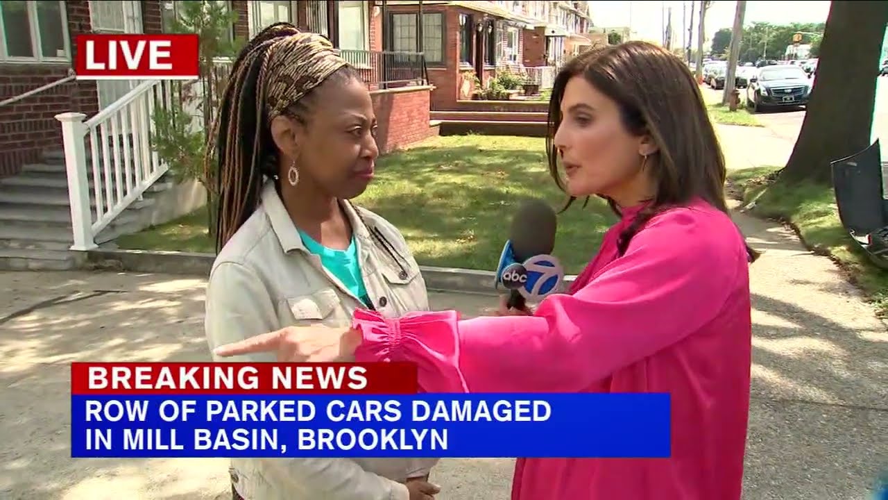Rows of parked cars damaged after being struck