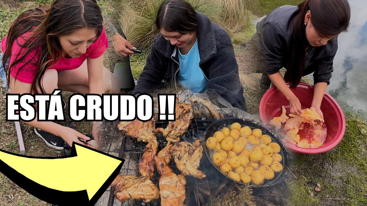 Cocinando en el páramo pollo crudo. La pareja del mejor sazón gana