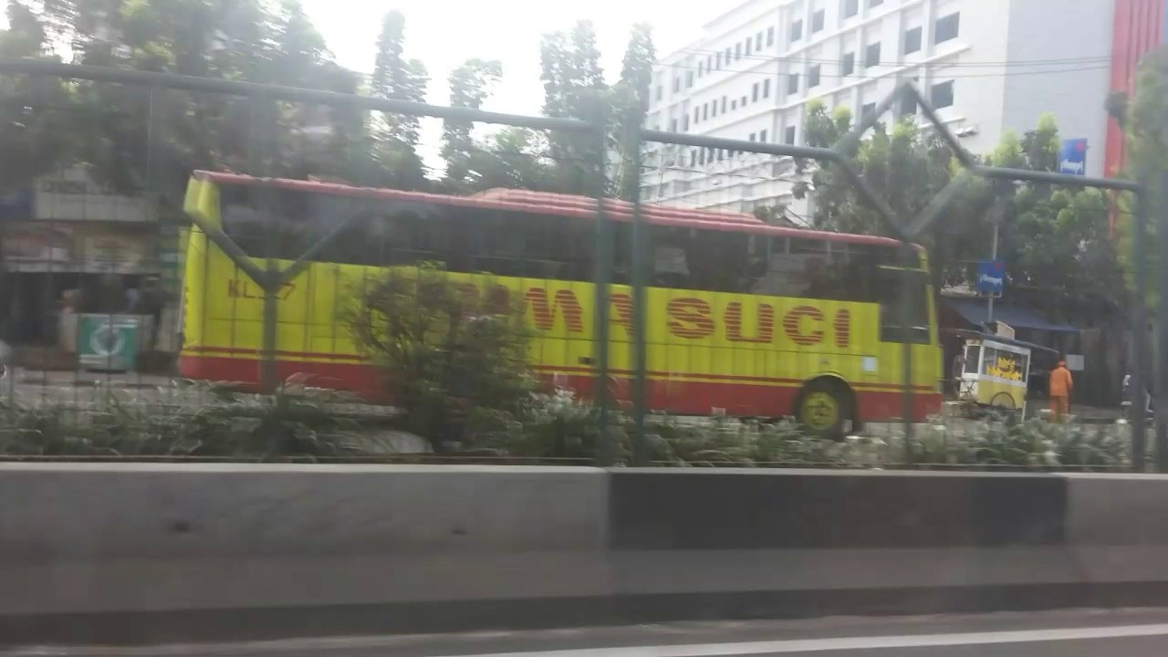 Foto bus bima suci vs bus primajasa