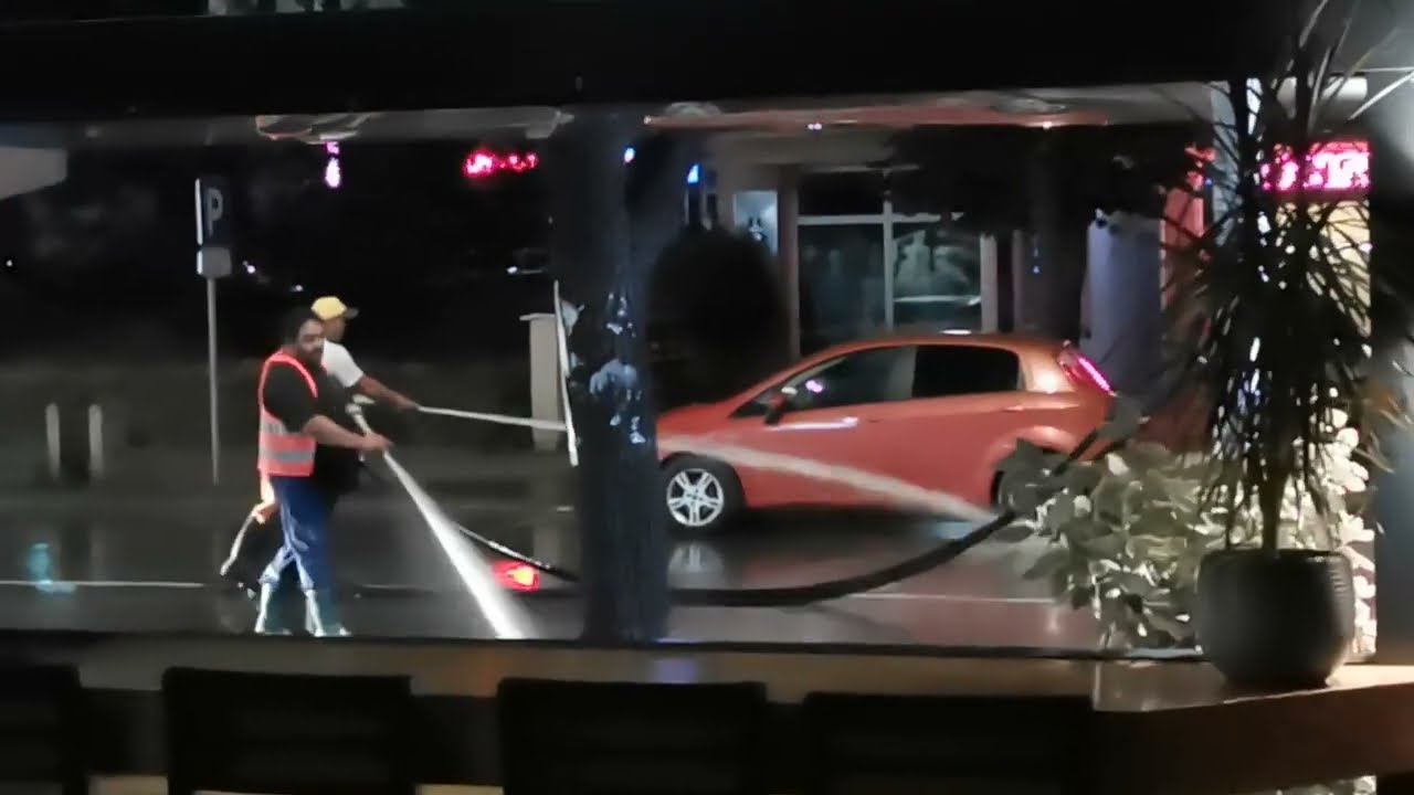 Kavadarci, North Macedonia, washing, sweeping the streets at night in the balkans