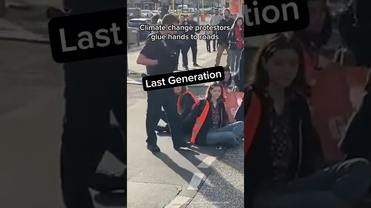 Climate Change Protestors Glue Their Hands to the Road