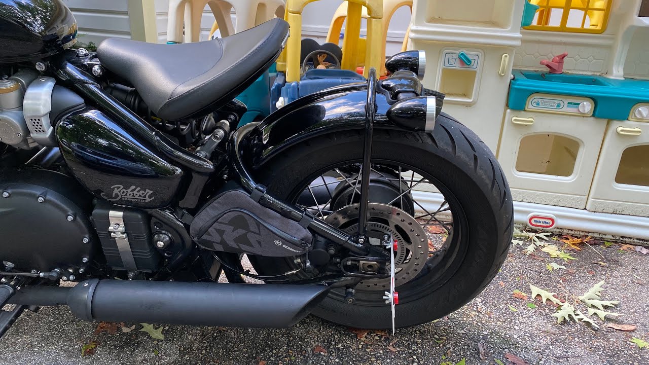 Triumph Bobber Black Short Rear Fender Install without removing the wheel.