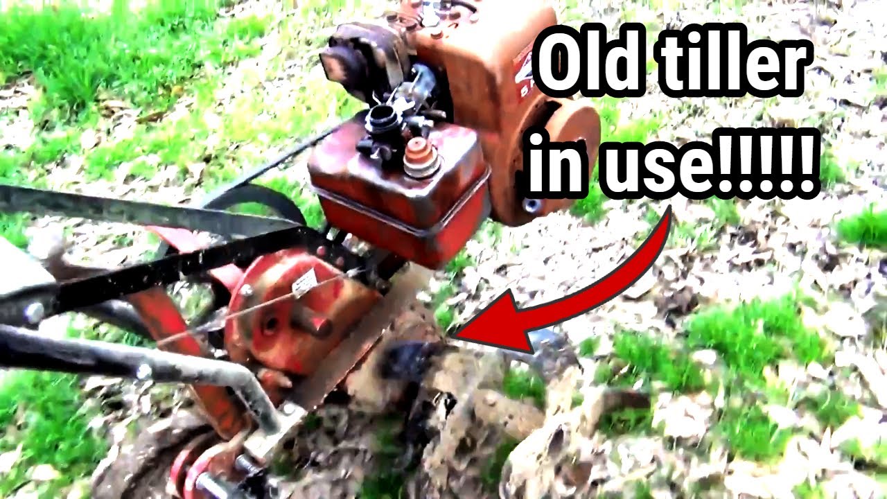 Antique tiller engine in use!