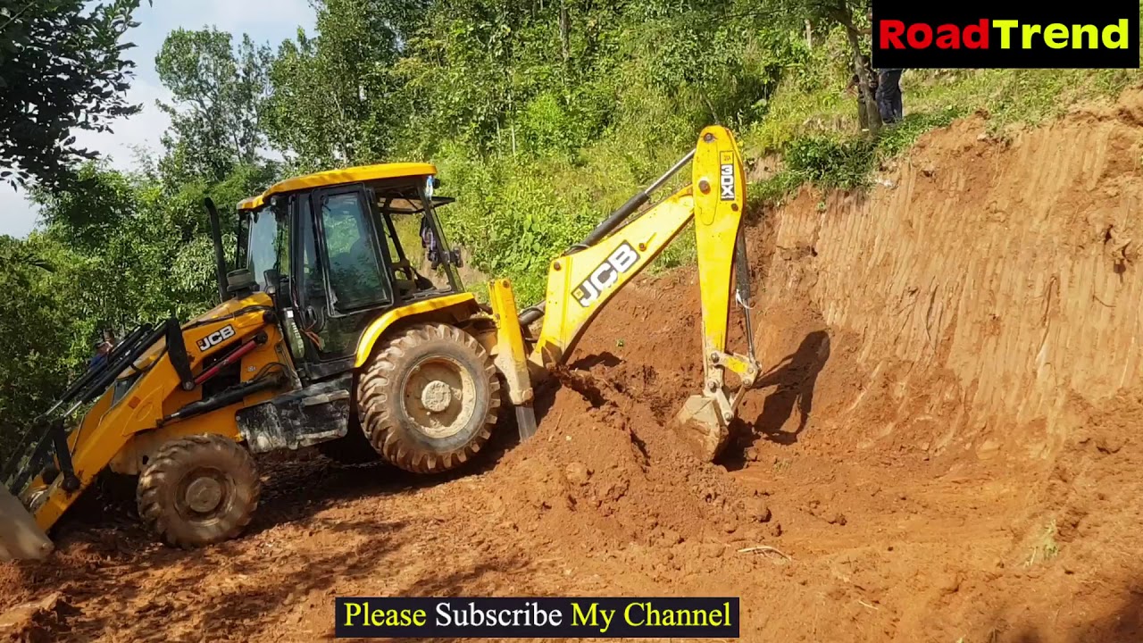 JCB 3DX Backhoe LEVELING HILL LAND TO PLANE.