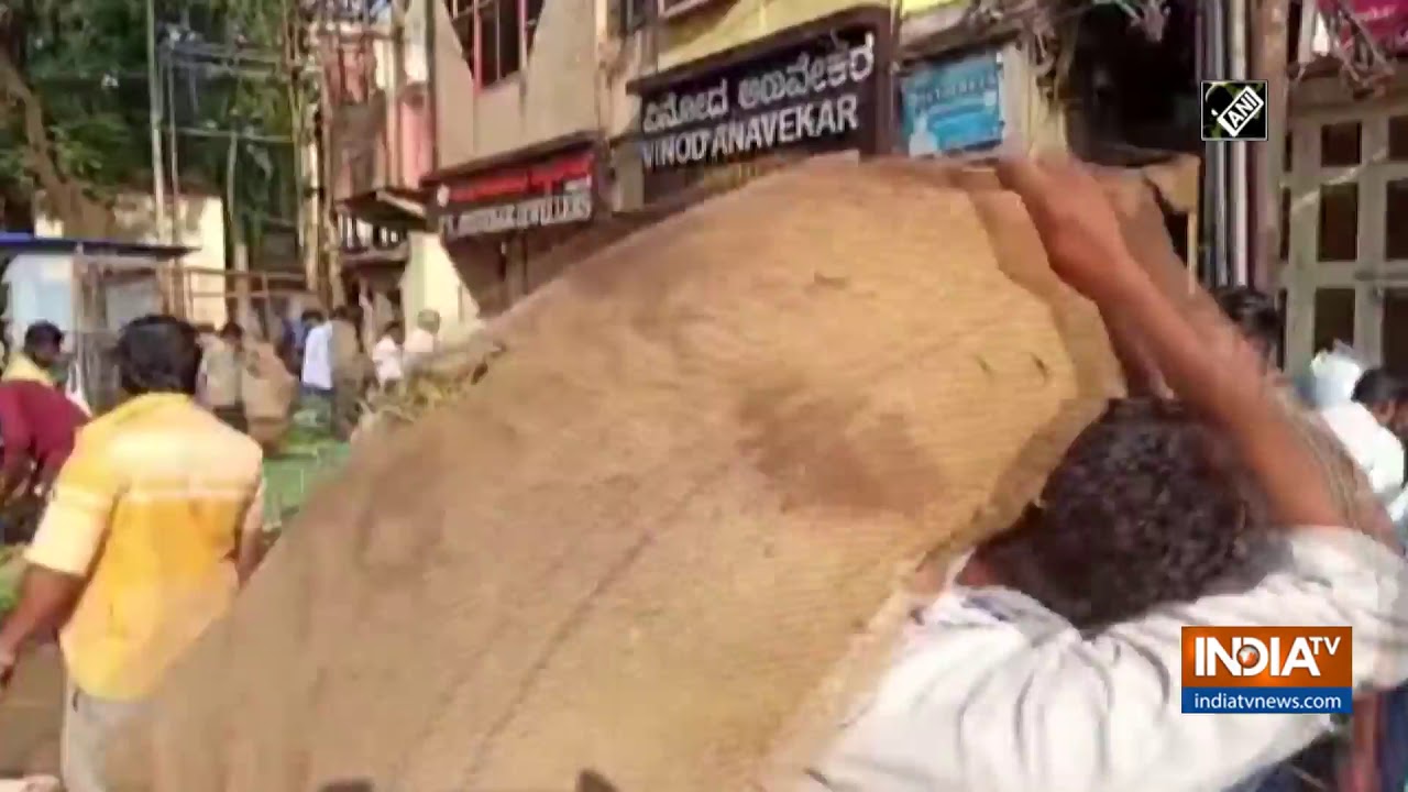 People violate social distancing rule amid India lockdown in Karnataka's Hubli