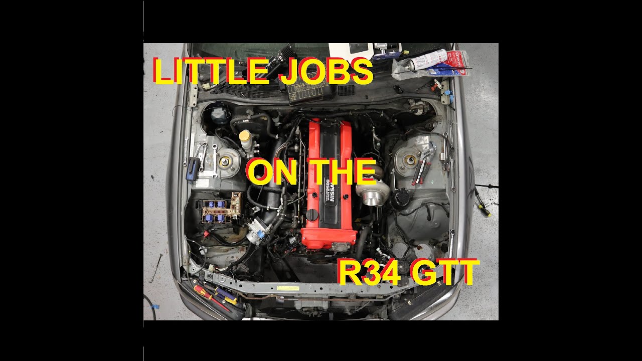 Fitting the wiring harness back into the R34 Skyline GTT !!