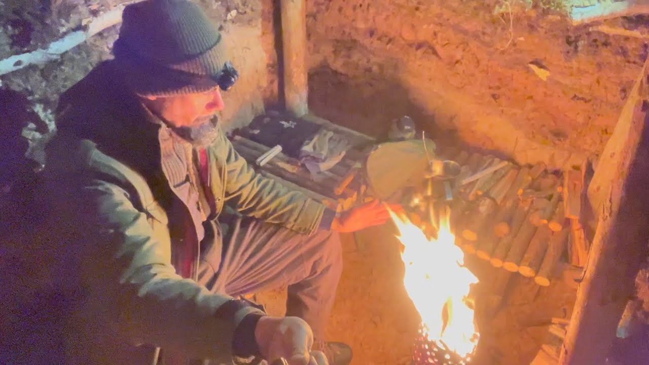 Surviving Winter in My Bushcraft Earth Shelter