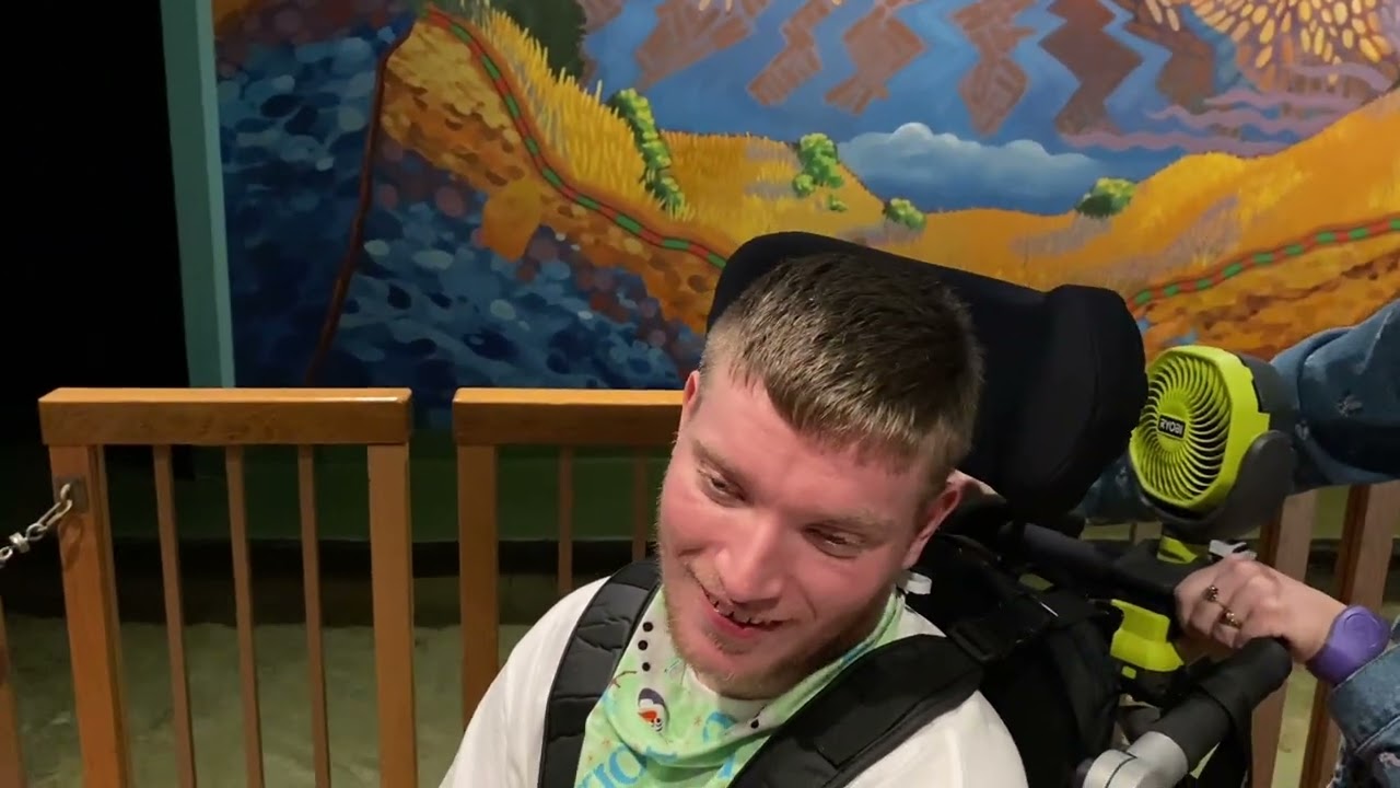 Sam taking elevator rides in the Land Pavilion at Epcot Park @onthatnote 