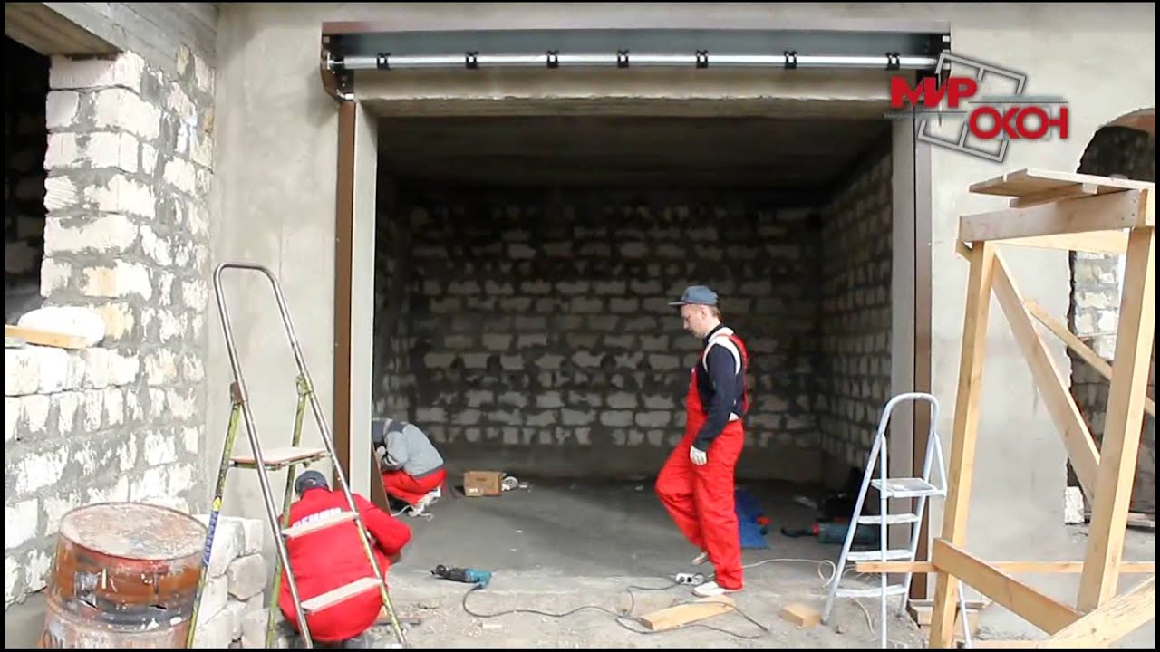 Монтаж гаражной  роллеты ALUTECH профиль AG77 c улитками на радиоуправлении